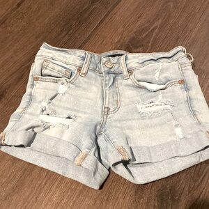Aero low rise midi light denim shorts